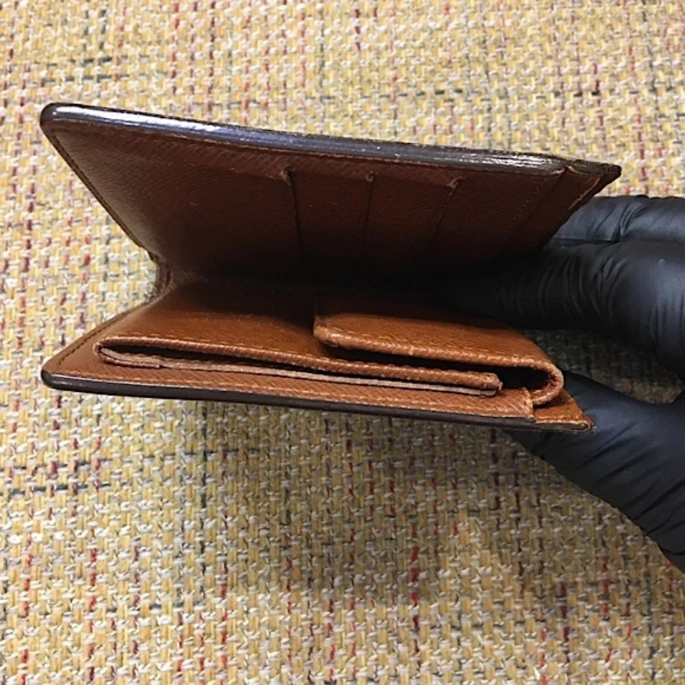 LOUIS VUITTON LV Monogramed Bifold Wallet CA0092 COMES WITH: LV Dust Bag